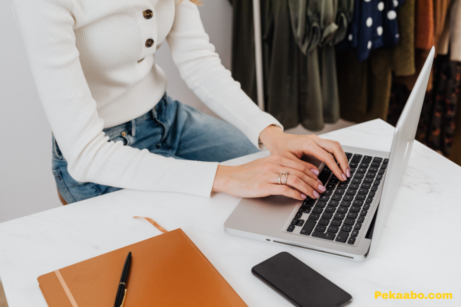 Email Marketing for Ecommerce: Campaigns That Drive Repeat Purchases 1 Online store owner working on laptop for ecommerce email marketing strategy